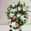 Ramo funerario en tonos rosas, blancos y verdes