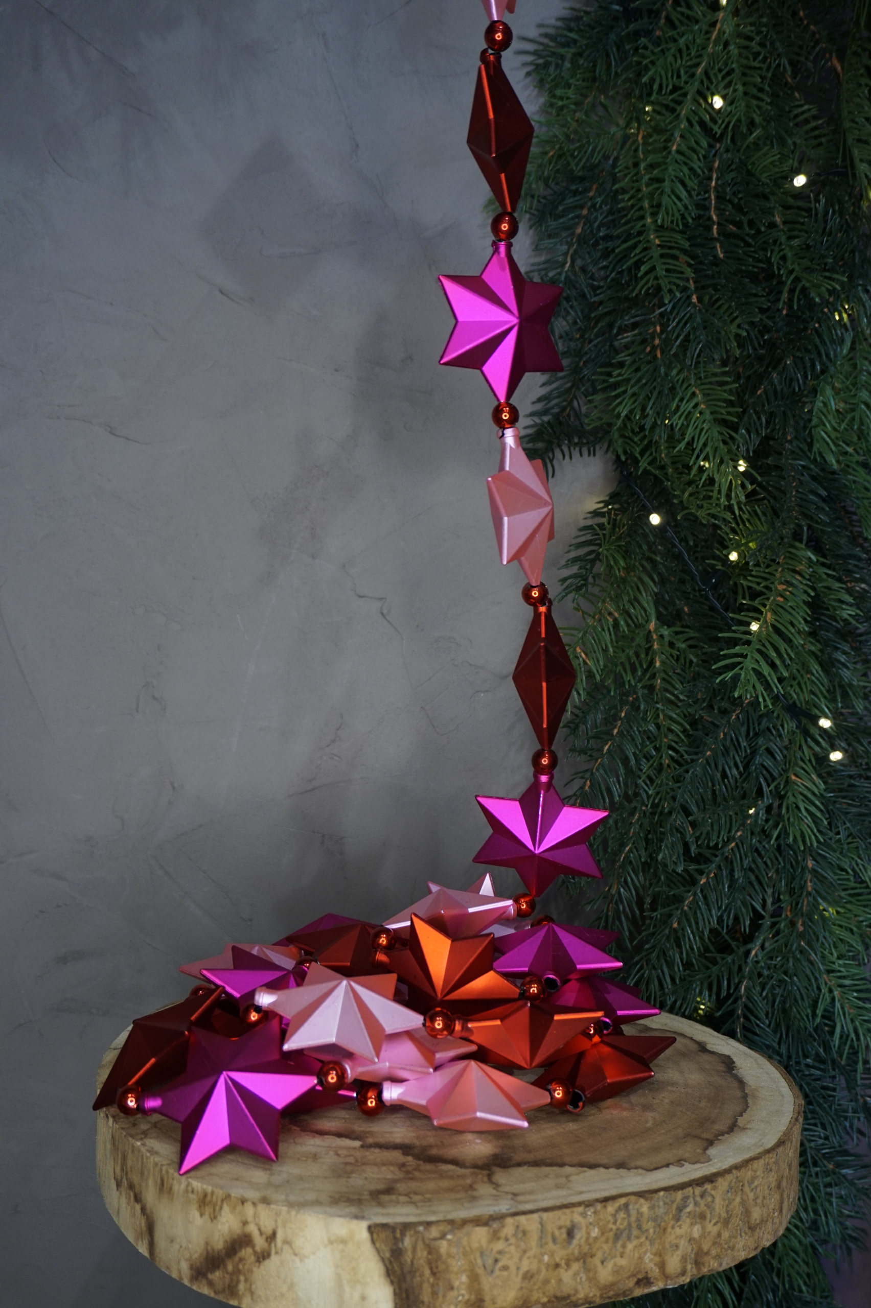 Decoración - Guirnalda de Navidad estrellas rojas y rosas